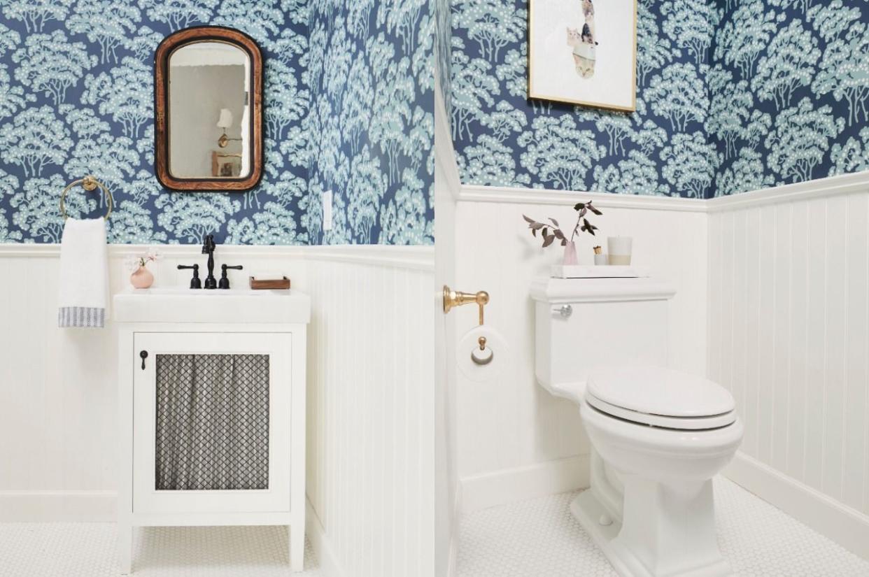 blue flower wallpaper with white toilet and sink