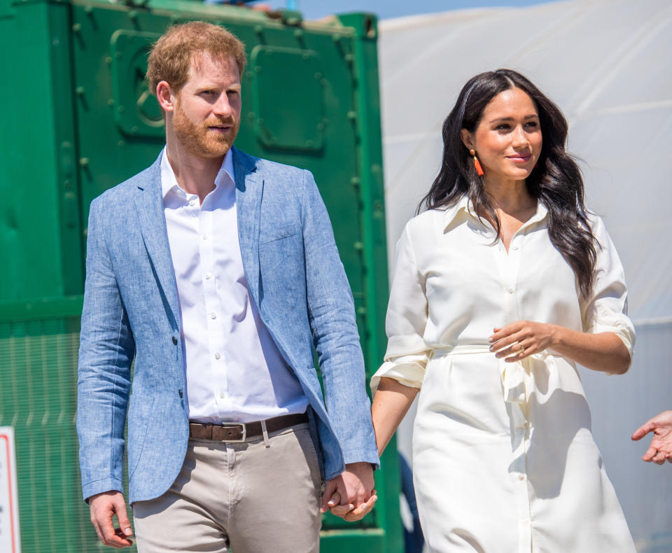 Prince Harry and Meghan, Duke and Duchess of Sussex during a visit to a township to learn about Youth Employment Services (YES), which aims to tackle the critical issue of youth unemployment in South Africa by creating one million new work opportunities in the next three years. (Photo by DPPA/Sipa USA)