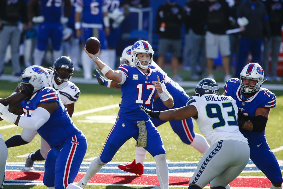 Buffalo Bills quarterback Josh Allen (17) looks to throw a pass during the first half of an NFL football game against the Seattle Seahawks, Sunday, Nov. 8, 2020, in Orchard Park, N.Y. (AP Photo/John Munson)