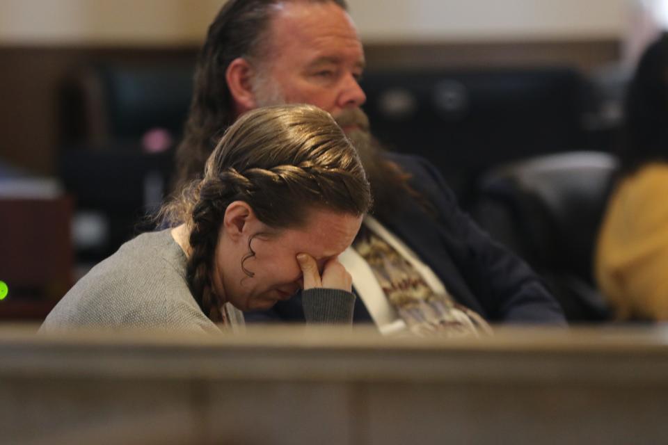 Alexis Murray Smith reacts to video footage of police giving her son Brent Sullivan CPR after he overdosed on fentanyl during Murray Smith's child abuse trial, Sept. 15, 2023 in Eddy County District Court.