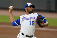 Atlanta Braves pitcher Huascar Ynoa (19) delivers in the first inning of a baseball game against the Miami Marlins, Monday, April 12, 2021, in Atlanta. (AP Photo/John Bazemore)