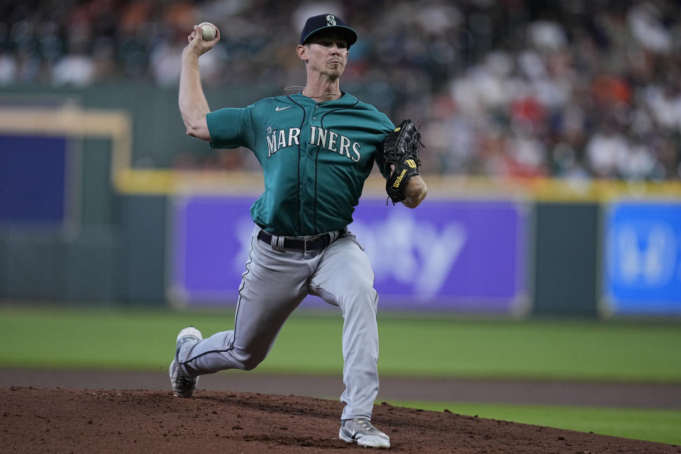 Seattle Mariners starting pitcher Emerson Hancock delivers during the first inning of a baseball game against the Houston Astros, Sunday, Aug. 20, 2023, in Houston. (AP Photo/Kevin M. Cox)