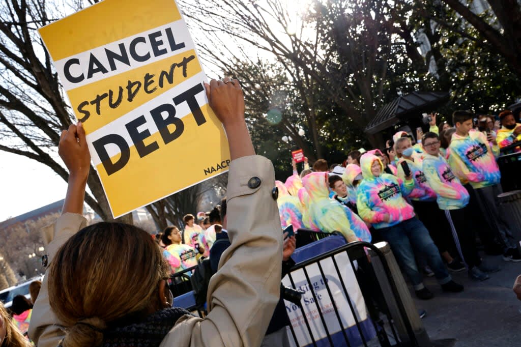 The Too Much Talent Band and local activists have a joyful protest of music and dancing outside of The White House to “Cancel Student Debt” on March 15, 2022 in Washington, DC. (Photo by Paul Morigi/Getty Images for We The 45 Million)