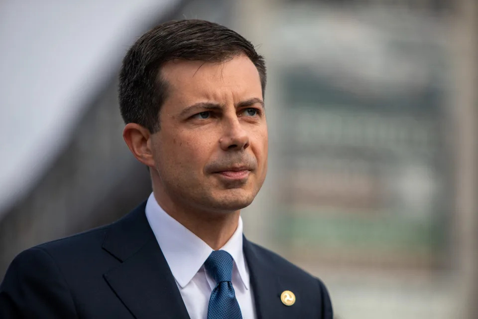 U.S. Secretary of Transportation Pete Buttigieg wears a pin with the Secretary of Transportation emblem during a press conference in Detroit on Thursday, Sept. 15, 2022. 