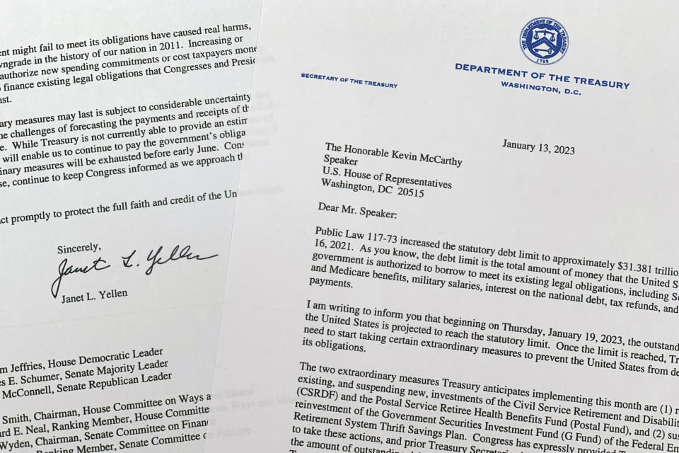 The letter from Treasury Secretary Janet Yellen to House Speaker Kevin McCarthy of Calif., photographed Friday, Jan. 13, 2023, notifying Congress that the U.S. is projected to reach its debt limit on Jan. 19, and will then resort to "extraordinary measures" to avoid default. (AP Photo/Jon Elswick)