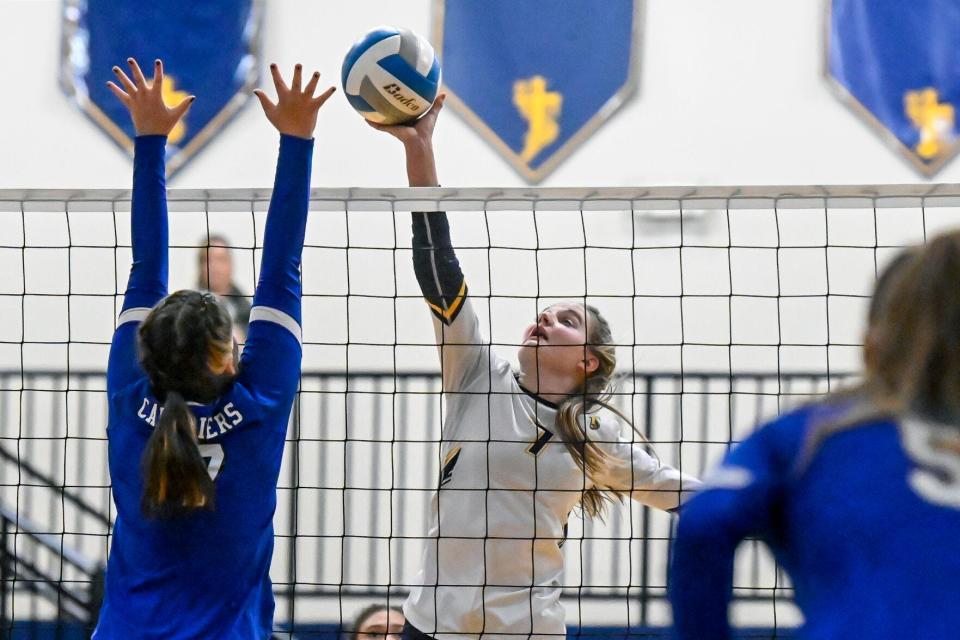 Rapid City Christian senior Olivia Kieffer reaches for the ball during a Sept. 22 match against St. Thomas More at Hart Ranch in Rapid City.