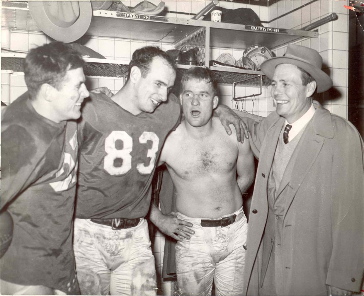 Left to right in Briggs Stadium following the 1953 championship victory are Doak Walker, Jim Doran, Bobby Layne and head coach Buddy Parker. The Lions were down 16-10 in the closing minutes and Layne marched the offense 80 yards to victory when he hit Doran for a 33-yard touchdown pass.