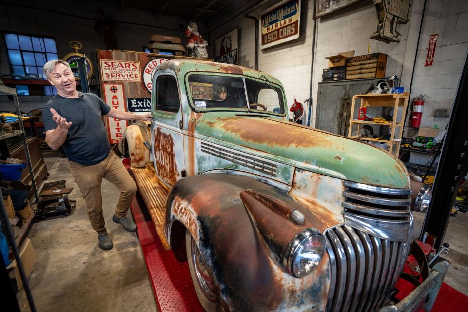 Rob Wolfe of "American Pickers" gives a tour of his warehouse in Davenport, Wednesday, Dec. 13, 2023.