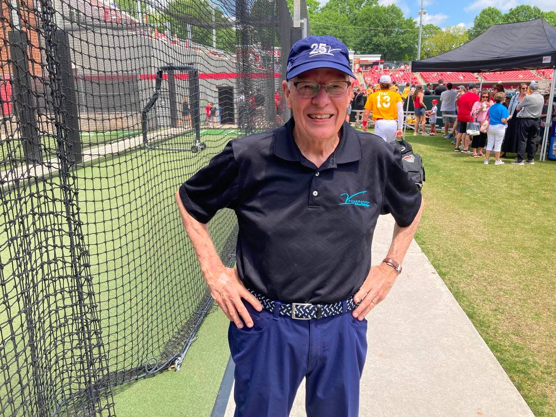 Dr. Joseph Moore, Jim Valvano’s oncologist in the last year of the NC State coach’s life, threw out a ceremonial first pitch at the “Victory Over Cancer” game April 28, 2024. Chip Alexander