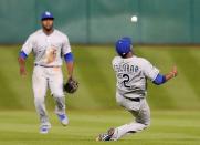 Apr 14, 2016; Houston, TX, USA; Kansas City Royals shortstop Alcides Escobar (2) makes a behind the back catch against Houston Astros first baseman Marwin Gonzalez (not pictured) in the six inning at Minute Maid Park. Thomas B. Shea-USA TODAY Sports