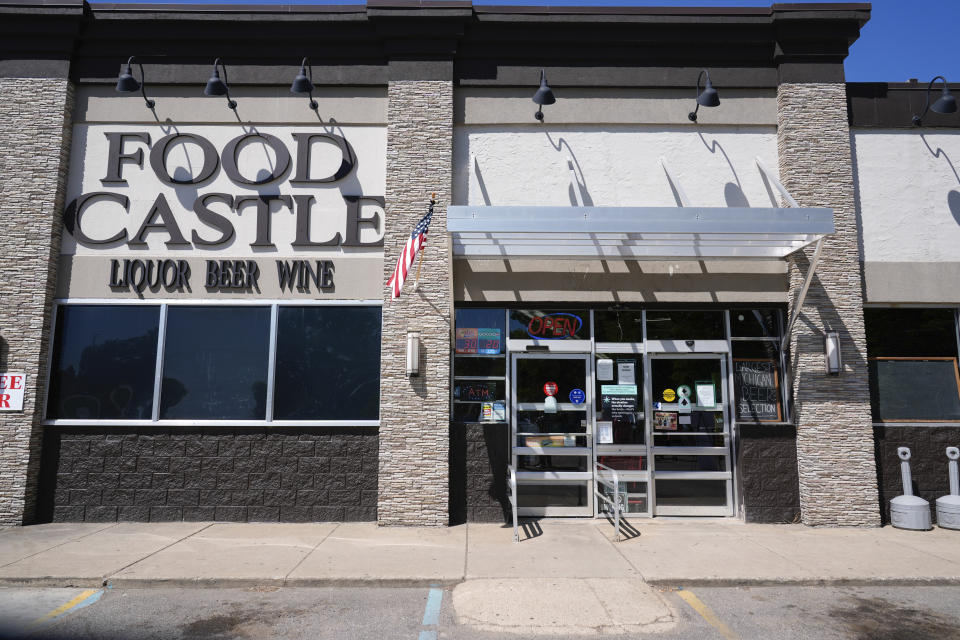 The exterior of the Food Castle is shown at a news conference announcing the the winner of the $842.4 million Powerball jackpot, from the Jan. 1, 2024 drawing, in Grand Blanc Township, Mich., Tuesday, June 11, 2024. (AP Photo/Paul Sancya)