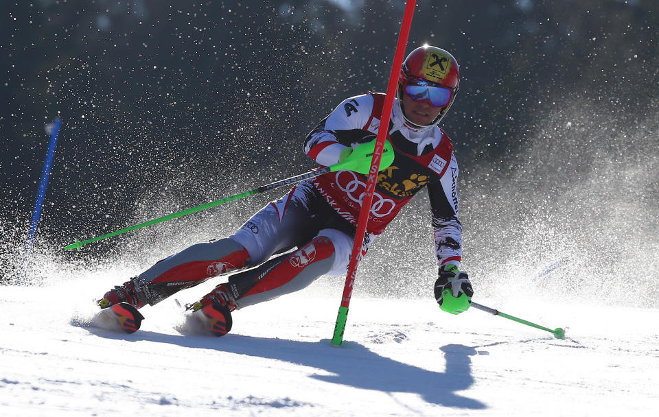 Marcel Hirscher of Austria competes during the first run of an alpine ski, men's World Cup slalom in Kranjska Gora, Slovenia, Sunday, March 9, 2014. (AP Photo/Giovanni Auletta)