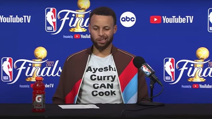 Steph Curry’s T-shirt expresses his sentiments at a post-game press conference Tuesday night following the Golden State Warriors’ defeat of the Boston Celtics in Game Five of the NBA Finals. (Photo: Screenshot/YouTube.com)