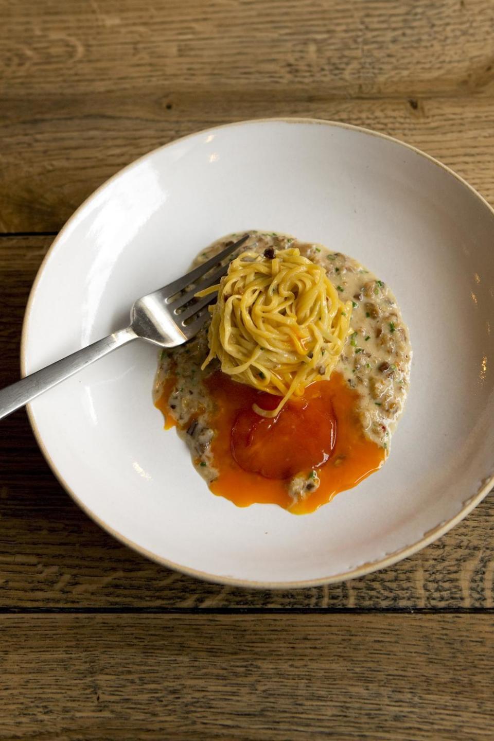 Dramatic: XO linguine topped with a cured egg yolk (Adrian Lourie)