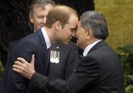 Britain's Prince William (C) receives a Maori welcome known as a "Hongi" at a traditional Maori Powhiri Ceremonial Welcome at Government House in Wellington April 7, 2014 in this handout provided by Woolf Crown Copyright. The Prince and his wife Kate are undertaking a 19-day official visit to New Zealand and Australia with their son George. REUTERS/Woolf Crown Copyright/Handout via Reuters (NEW ZEALAND - Tags: ROYALS ENTERTAINMENT POLITICS) NO SALES. NO ARCHIVES. FOR EDITORIAL USE ONLY. NOT FOR SALE FOR MARKETING OR ADVERTISING CAMPAIGNS. ATTENTION EDITORS - THIS IMAGE HAS BEEN SUPPLIED BY A THIRD PARTY. REUTERS IS UNABLE TO INDEPENDENTLY VERIFY THE AUTHENTICITY, CONTENT, LOCATION OR DATE OF THIS IMAGE. THIS PICTURE WAS PROCESSED BY REUTERS TO ENHANCE QUALITY. AN UNPROCESSED VERSION WILL BE PROVIDED SEPARATELY. MANDATORY CREDIT