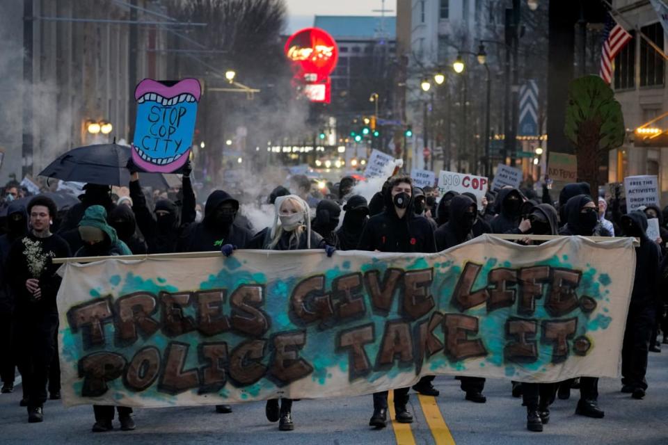 <div class="inline-image__caption"><p>Protesters near the planned site of a controversial “Cop City” project, in Atlanta.</p></div> <div class="inline-image__credit">Cheney Orr</div>