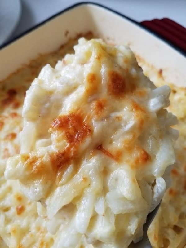 <p>Moore or Less Cooking</p><p>This homemade Easy Cheesy Hashbrown Casserole is so easy to make at home. It’s perfect for potlucks or any time you are needing to feed a crowd like during Thanksgiving! </p><p><strong>G</strong><strong>et the recipe: </strong><a href="https://mooreorlesscooking.com/2018/03/easy-cheesy-hash-brown-casserole-video/" rel="nofollow noopener" target="_blank" data-ylk="slk:Easy Cheesy Hashbrown Casserole;elm:context_link;itc:0;sec:content-canvas" class="link rapid-noclick-resp"><strong>Easy Cheesy Hashbrown Casserole</strong></a></p>
