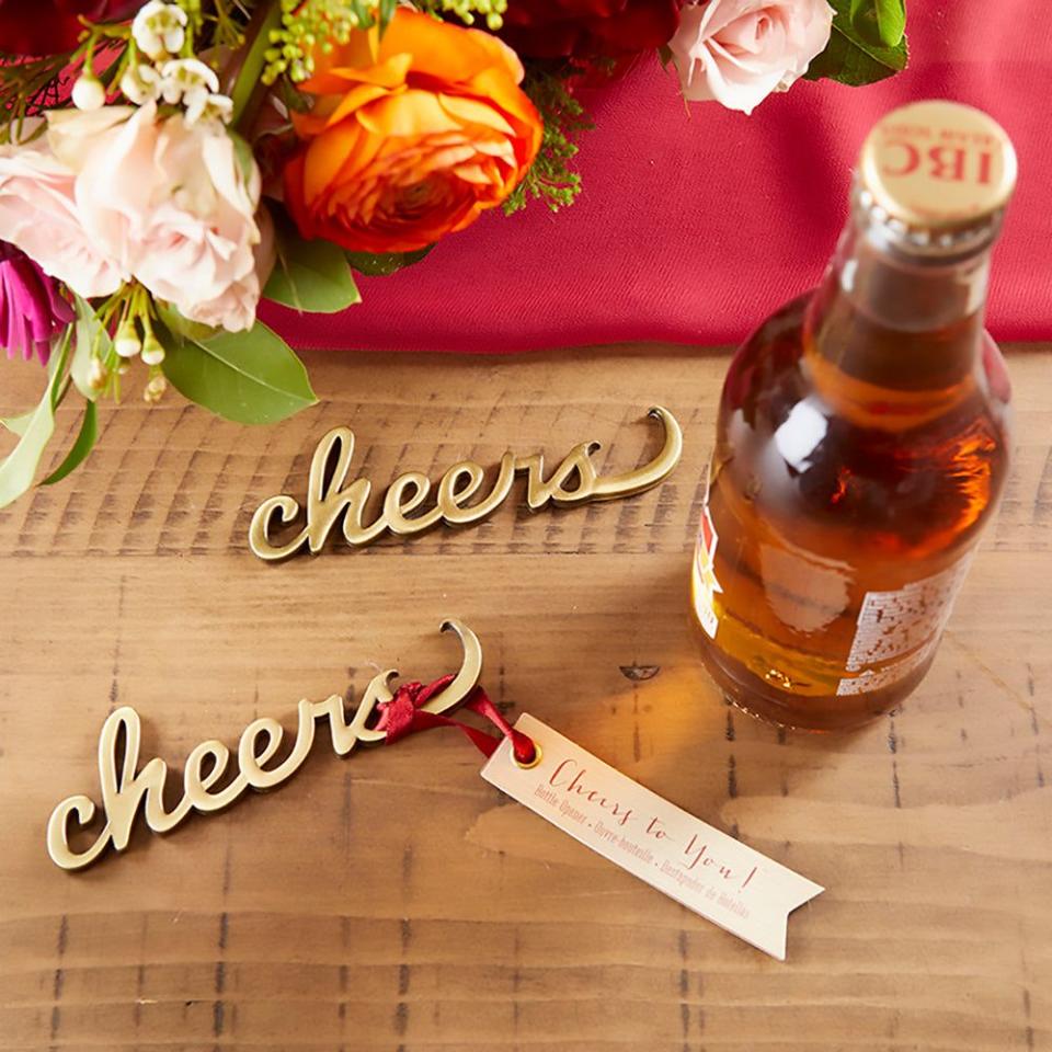 <p><strong>kateaspen</strong></p><p>kateaspen.com</p><p><strong>$3.30</strong></p><p>Say cheers to this holiday season or New Year with these antique matte gold metal bottle openers. They're even presented with a red satin ribbon and "Cheers to You" tag you can personalize. </p>