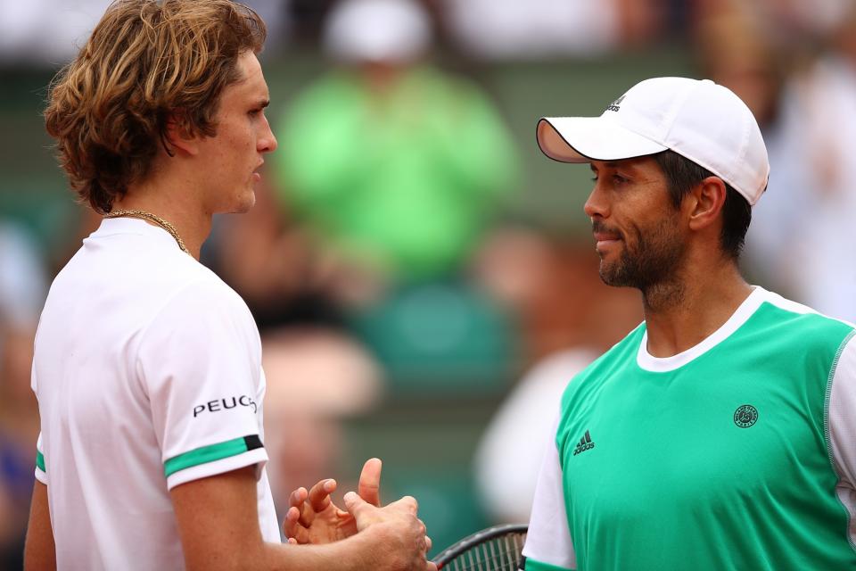 Fernando Verdasco of Spain and Alexander Zverev of Germany shake hands at the net following the first round match on day three of the 2017 French Open at Roland Garros on May 30, 2017 in Paris, France
