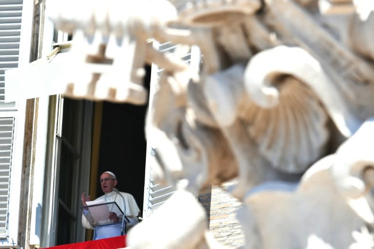 Pope Francis delivers his message to pilgrims gathered in St. Peter's square, during his Angelus prayer at the Vatican on August 28, 2016