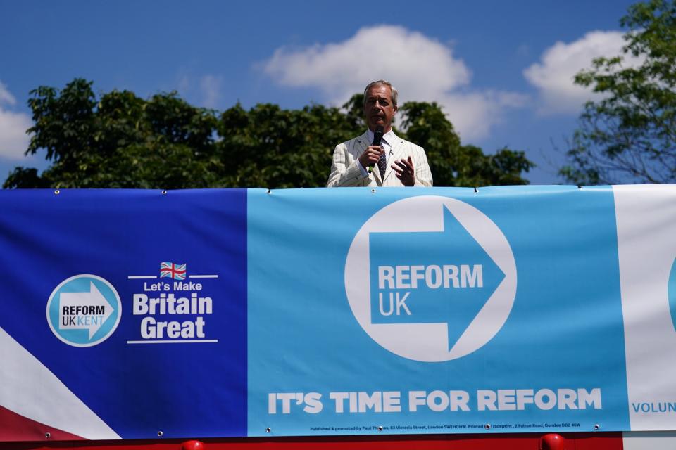 Reform UK leader Nigel Farage speaking on top of a double decker bus in Maidstone, Kent, during the election campaign trail (Jordan Pettitt/PA) (PA Wire)