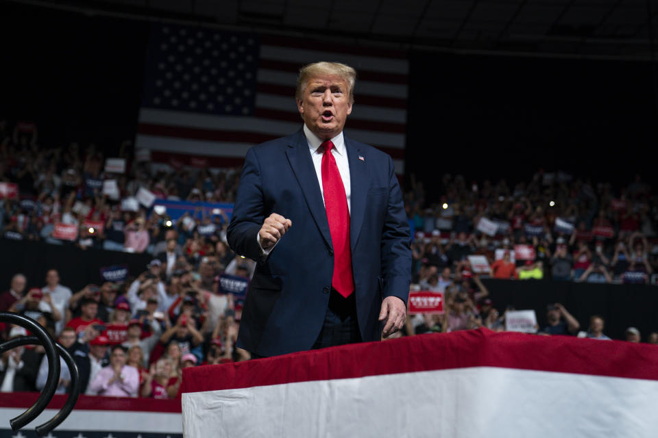 President Donald Trump arrives to speak at a campaign rally at Veterans Memorial Coliseum, Wednesday, Feb. 19, 2020, in Phoenix. (AP Photo/Evan Vucci)