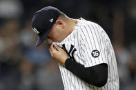 New York Yankees pitcher Sal Romano walks to the dugout during the seventh inning of the team's baseball game against the Toronto Blue Jays on Thursday, Sept. 9, 2021, in New York. (AP Photo/Adam Hunger)