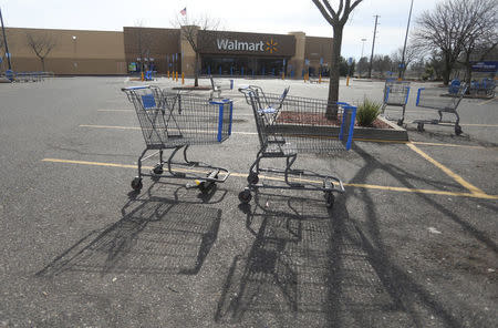 A vacant Walmart is pictured as water is released from the Lake Oroville Dam after an evacuation was ordered for communities downstream from the dam in Oroville, California, U.S. February 13, 2017. REUTERS/Jim Urquhart