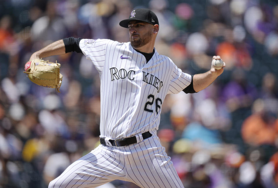 Colorado Rockies starting pitcher Austin Gomber works against the Houston Astros in the first inning of a baseball game Wednesday, July 19, 2023, in Denver. (AP Photo/David Zalubowski)