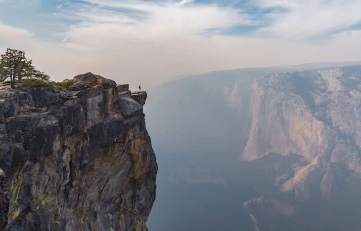 The iconic shot at the unfenced overlook of Taft Point in Yosemite