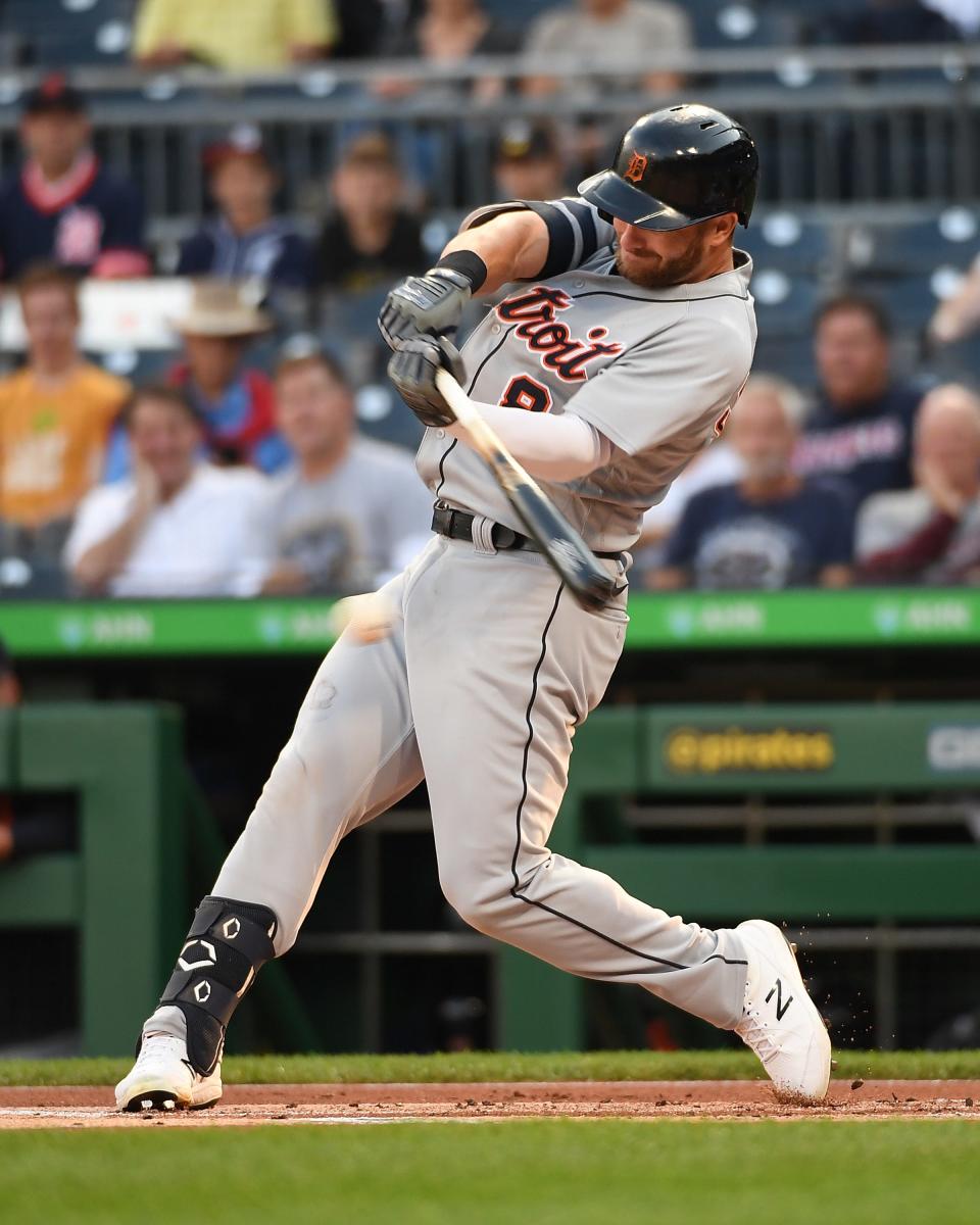 Robbie Grossman #8 of the Detroit Tigers singles in the first inning during the game against the Pittsburgh Pirates at PNC Park on September 8, 2021 in Pittsburgh, Pennsylvania.