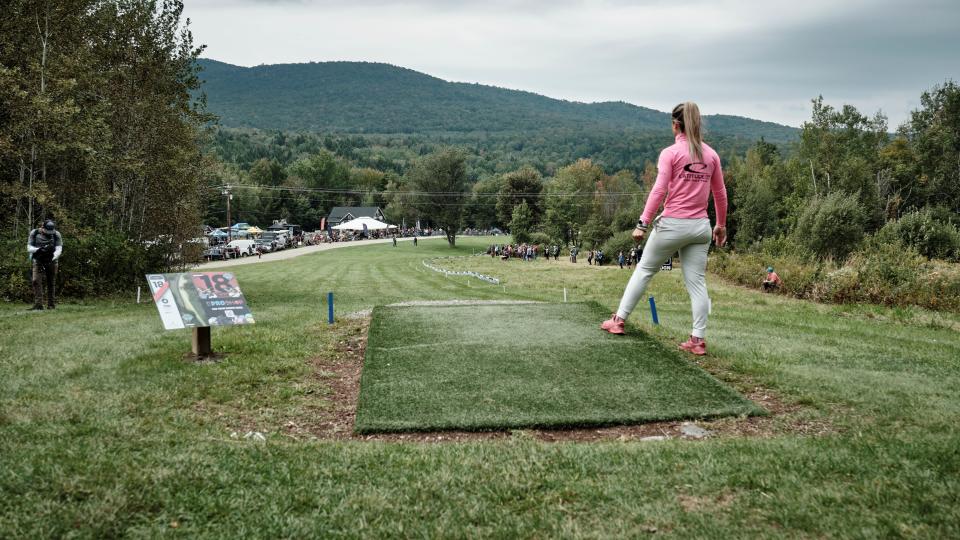 A competitor prepares to throw at the 2022 Green Mountain Championship for disc golf at Smugglers' Notch Ski Resort.