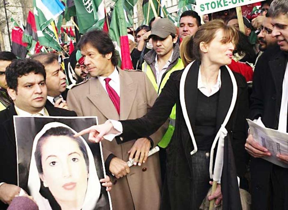 Imran and Jemima Khan join a demonstration outside Downing Street (AP)