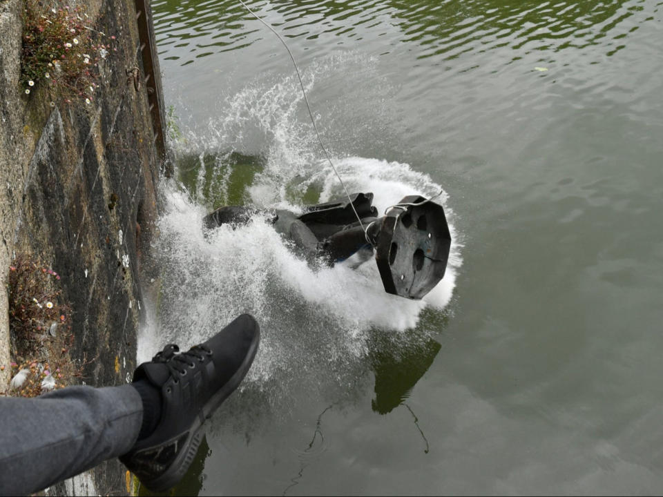 Colston statue being thrown in the river in JunePA