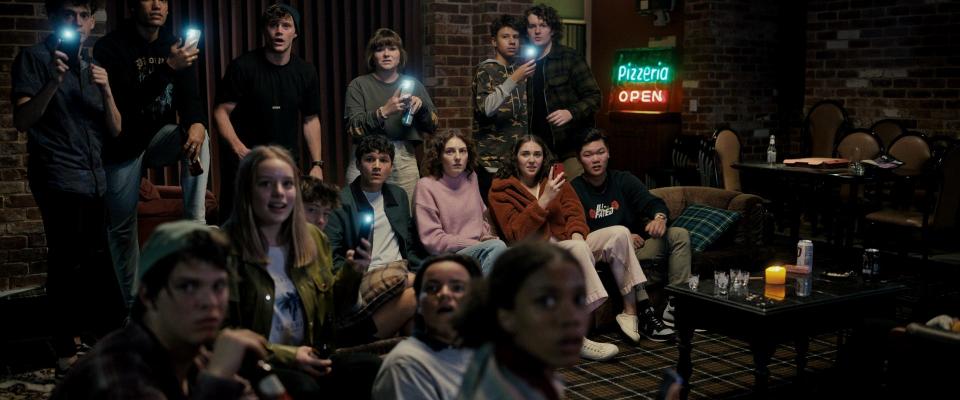 A party full of teenagers livestreams a possession of one of their own in the horror film "Talk to Me."