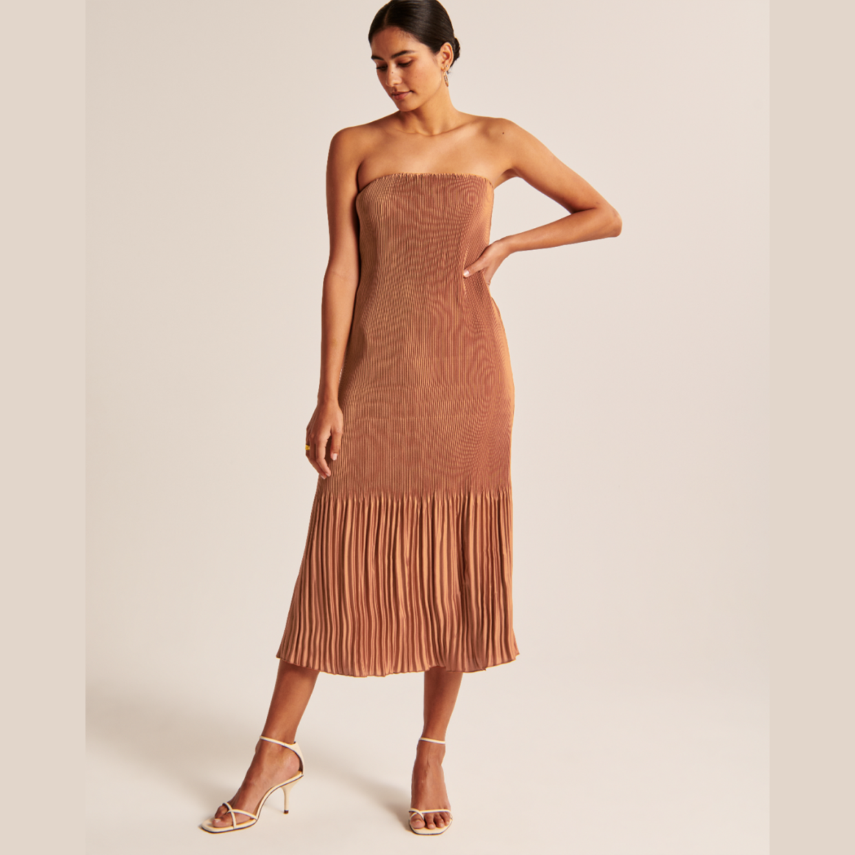 <p><a href="https://go.redirectingat.com?id=74968X1596630&url=https%3A%2F%2Fwww.abercrombie.com%2Fshop%2Fus%2Fp%2Fstrapless-pleat-release-midi-dress-53340819%3FcategoryId%3D63451269%26faceout%3Dmodel%26seq%3D02&sref=https%3A%2F%2Fwww.womenshealthmag.com%2Frelationships%2Fg38439489%2Fbest-winter-wedding-guest-dresses%2F" rel="nofollow noopener" target="_blank" data-ylk="slk:Shop Now;elm:context_link;itc:0;sec:content-canvas" class="link rapid-noclick-resp">Shop Now</a></p><p>Giselle Pleat Release Midi Dress</p><p>abercrombie.com</p><p>$110.50</p>