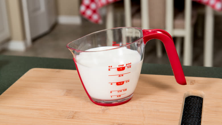 Milk in a measuring cup