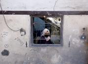 Aftermath of Israeli strike on a house, in Rafah