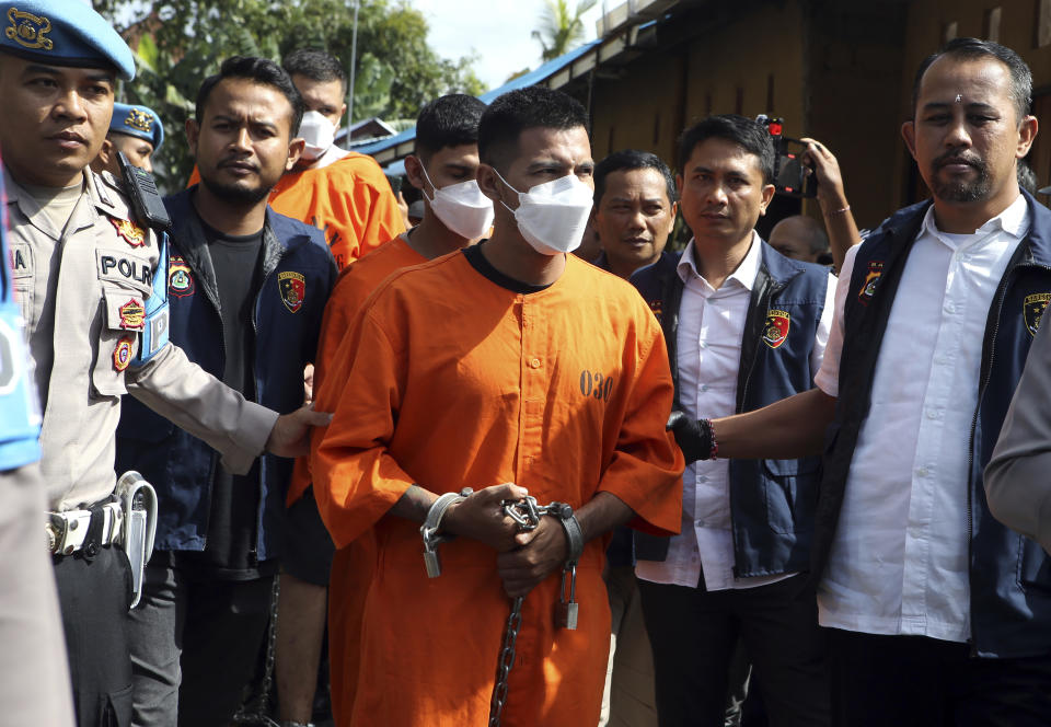 Indonesian police arrest three Mexicans after a Turkish tourist was wounded in an armed robbery in Bali, Indonesia on Tuesday, Jan. 30, 2024. Indonesian police said Tuesday they have arrested three Mexicans for alleged robbery on the resort island of Bali that left a tourist from Turkey badly wounded. (AP Photo/Firdia Lisnawati)