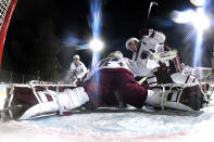 <p>Goaltender Philipp Grubauer #31 of the Colorado Avalanche stretches to make a save against the Vegas Golden Knights during the second period of the 2021 Bridgestone NHL Outdoors Saturday on the 18th fairway of the Edgewood Tahoe Resort, at the south shore of Lake Tahoe on February 20, 2021 in Stateline, Nevada. (Photo by Brian Babineau/NHLI via Getty Images)</p> 