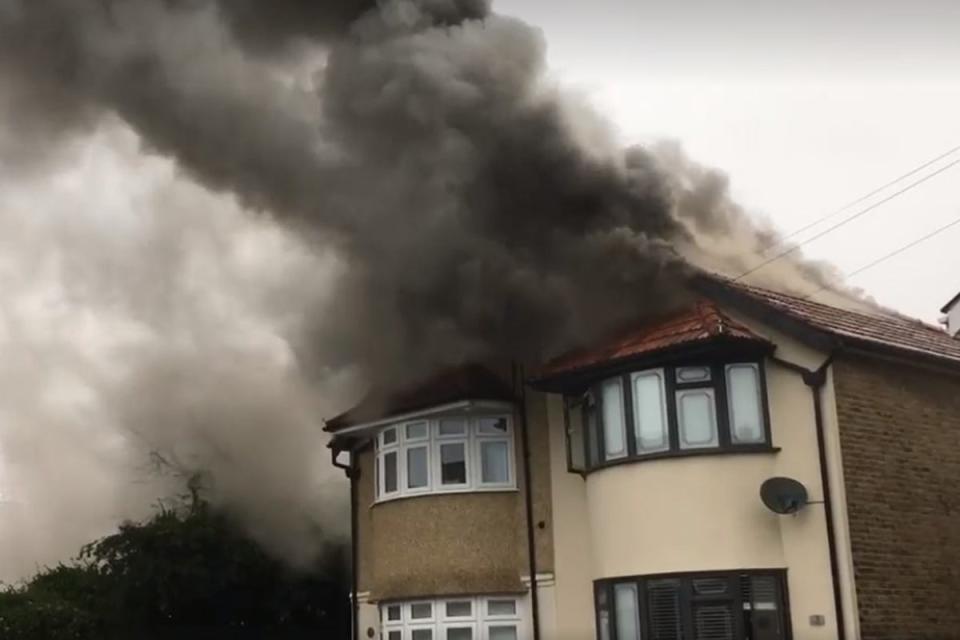 Smoke billows out of the roof (Noel Walsh)