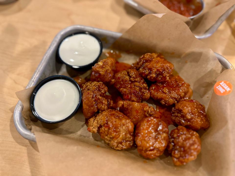 Buffalo Wild Wings boneless wings with two dipping sauces 