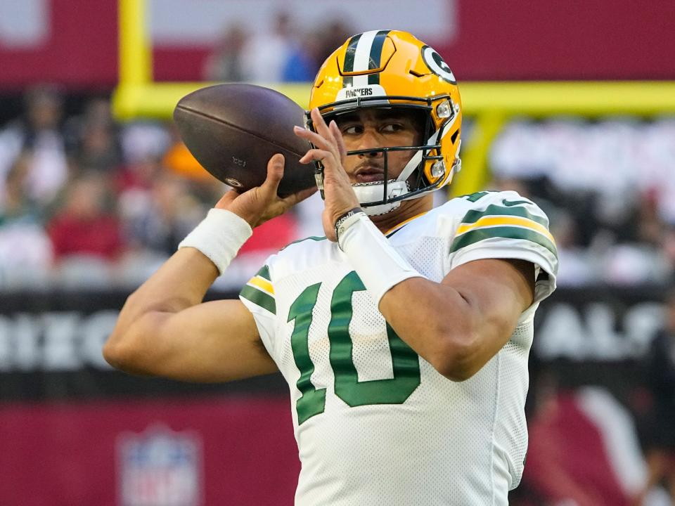 Jordan Love warms up before a game against the Arizona Cardinals.