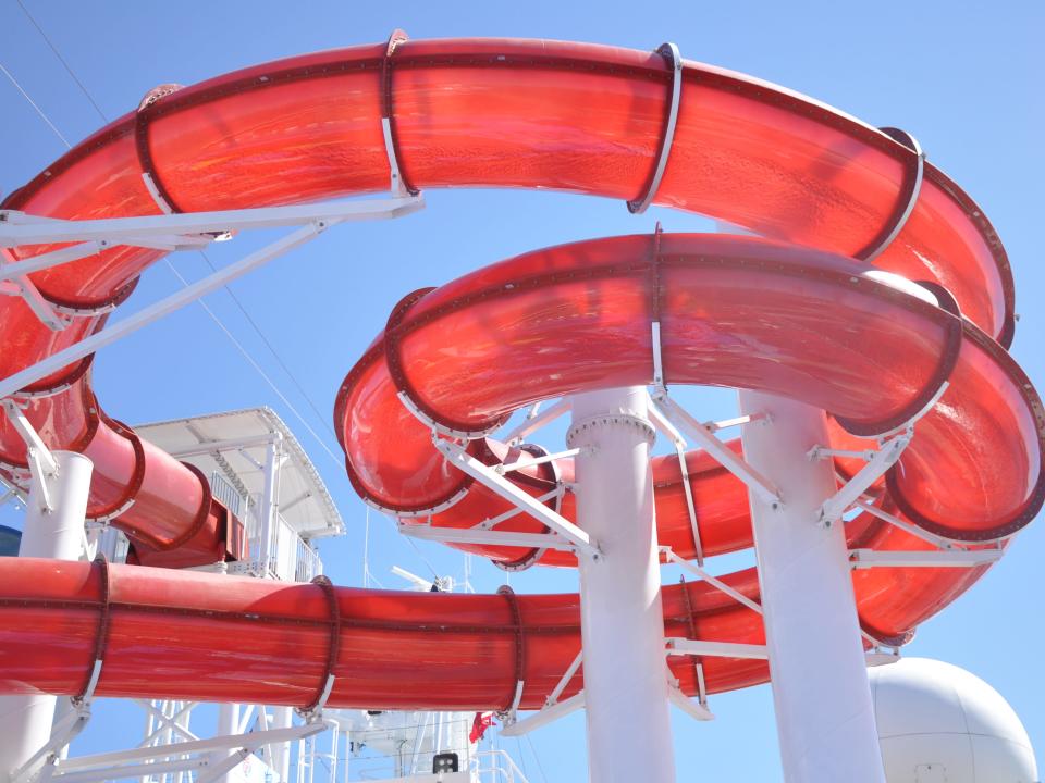Red waterslides on a cruise ship.