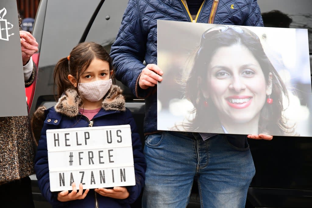 Nazanin Zaghari-Ratcliffe’s daughter, Gabriella, at a protest outside the Iranian Embassy in London (Ian West/PA) (PA Archive)