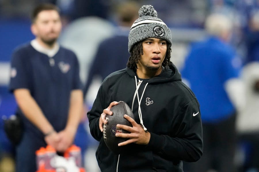 Houston Texans quarterback C.J. Stroud warms up before an NFL football game against the Indianapolis Colts, Saturday, Jan. 6, 2024, in Indianapolis. (AP Photo/Michael Conroy)