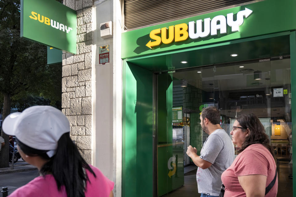 MADRID, SPAIN - 2023/08/23: Pedestrians walk past the American sandwich fast food restaurant franchise Subway store in Spain. (Photo by Xavi Lopez/SOPA Images/LightRocket via Getty Images)