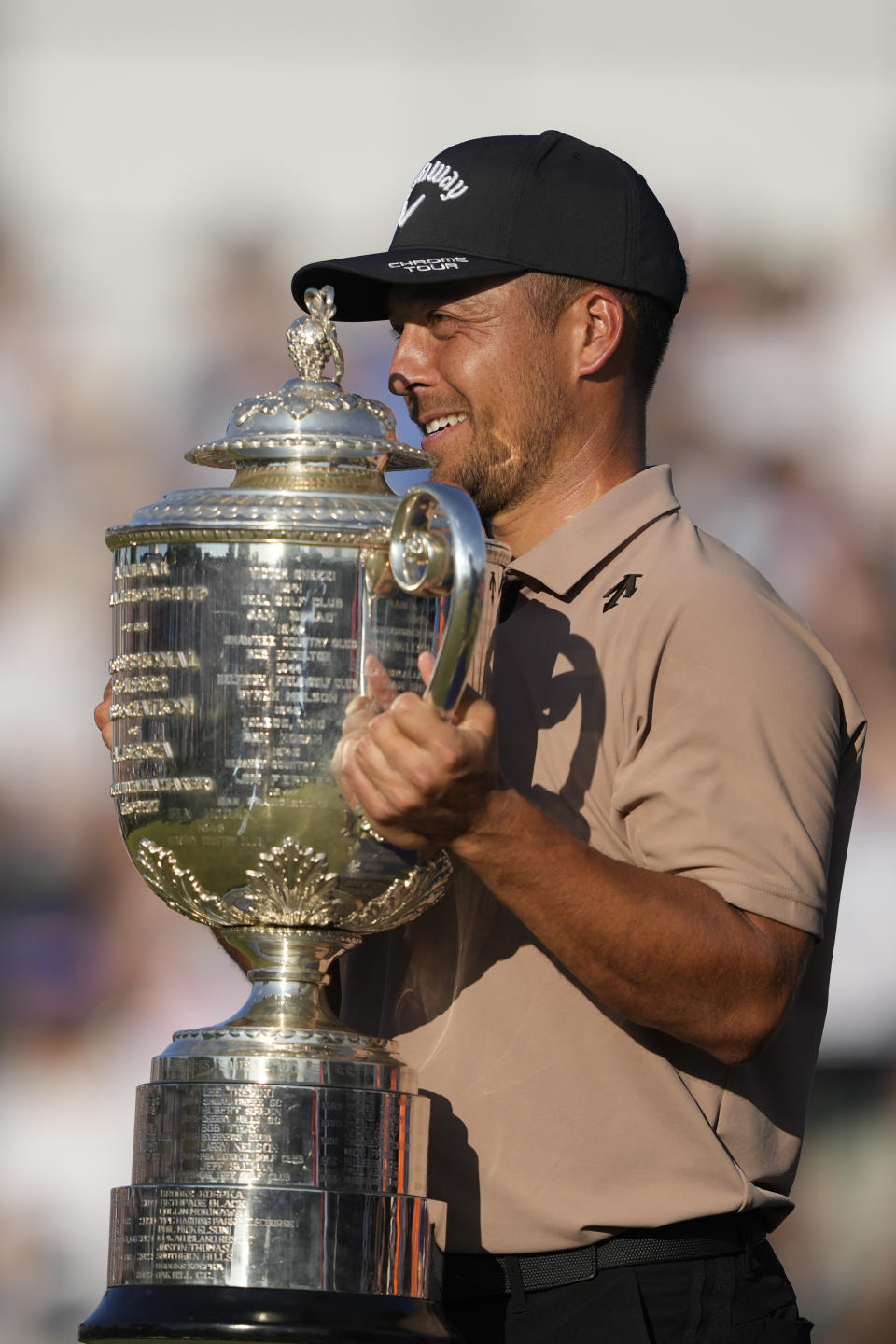 Xander Schauffele holds the Wanamaker trophy after winning the PGA Championship golf tournament at the Valhalla Golf Club, Sunday, May 19, 2024, in Louisville, Ky. (AP Photo/Matt York)