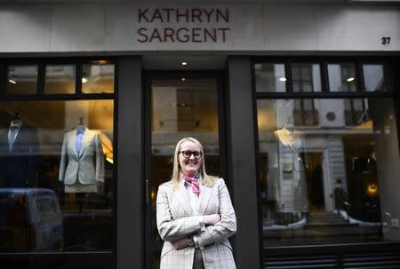 Master Tailor Kathryn Sargent poses outside her Bespoke Tailoring shop at Saville Row in central London, Britain, April 6, 2016 . REUTERS/Dylan Martinez