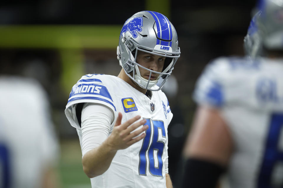 NEW ORLEANS, LOUISIANA – DECEMBER 03: Jared Goff #16 of the Detroit Lions walks across the field at halftime against the New Orleans Saints at the Caesars Superdome on December 03, 2023 in New Orleans, Louisiana. (Photo by Chris Graythen/Getty Images)